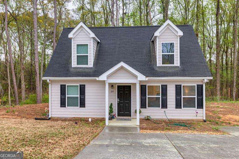 Available for lease-purchase. This stunning 2-story home in Loganville offers 4 spacious bedrooms and 2 modern bathrooms, The home features brand-new luxury vinyl plank flooring throughout the main living areas and plush carpet in the bedrooms for comfort and style. The expansive Primary bedroom suite includes a large walk-in closet, providing plenty of storage. The kitchen is equipped with sleek stainless steel appliances and beautiful granite countertops. Just off Highway 78, this home is conveniently located just minutes from shopping, dining, and all the amenities Loganville has to offer. It's the perfect blend of comfort, style, and convenience!