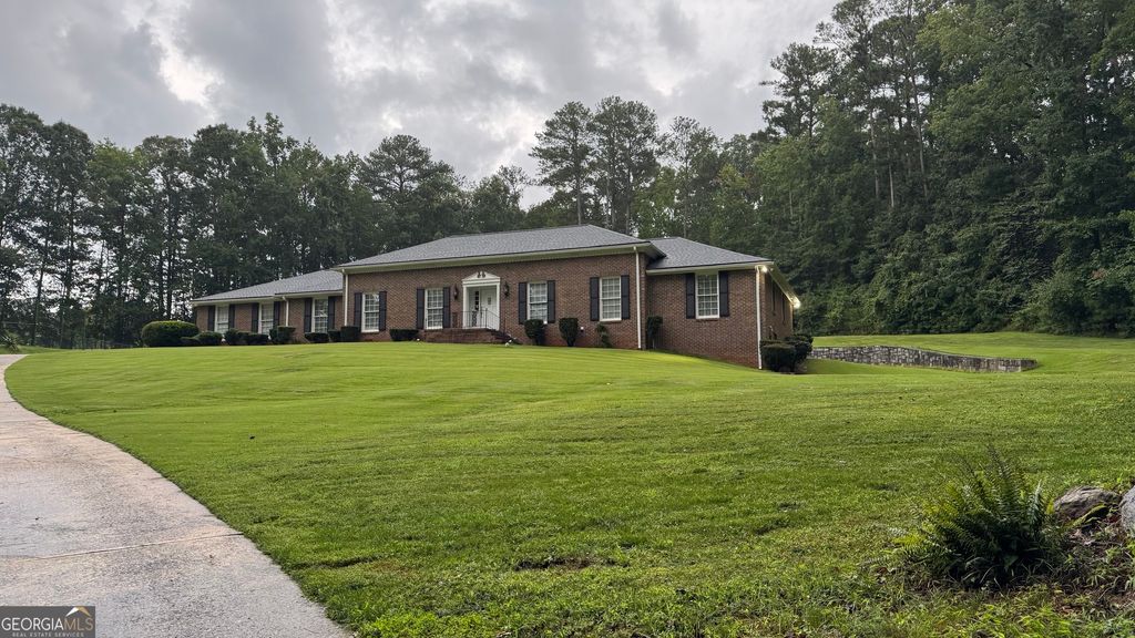 Photo of 5025 Greentree Trail, South Fulton, GA 30349 (MLS # 10736308)