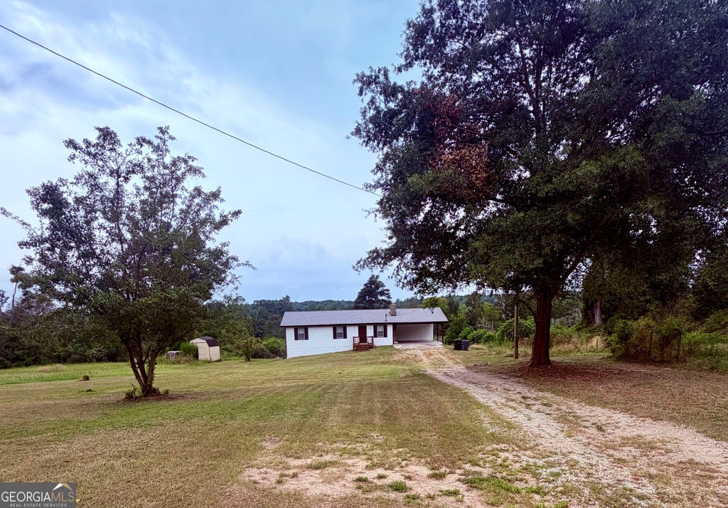 Photo of 979 McDaniel Mill Road SW, Conyers, GA 30094 (MLS # 10836108)