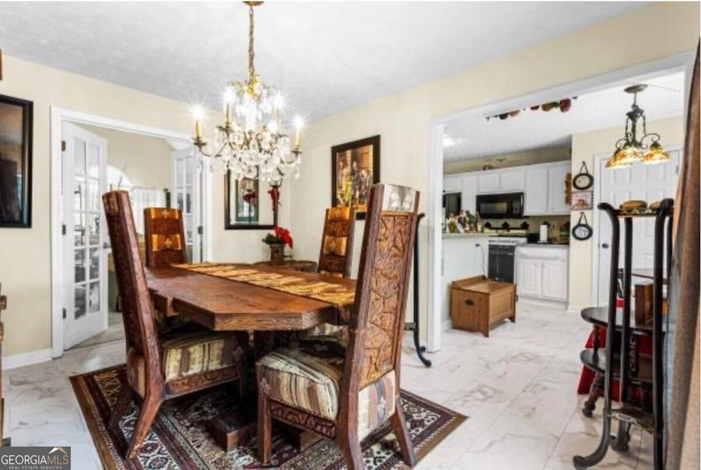 Photo of 8107 Birch Walk Drive, Riverdale, GA 30274 (MLS # 10846755)