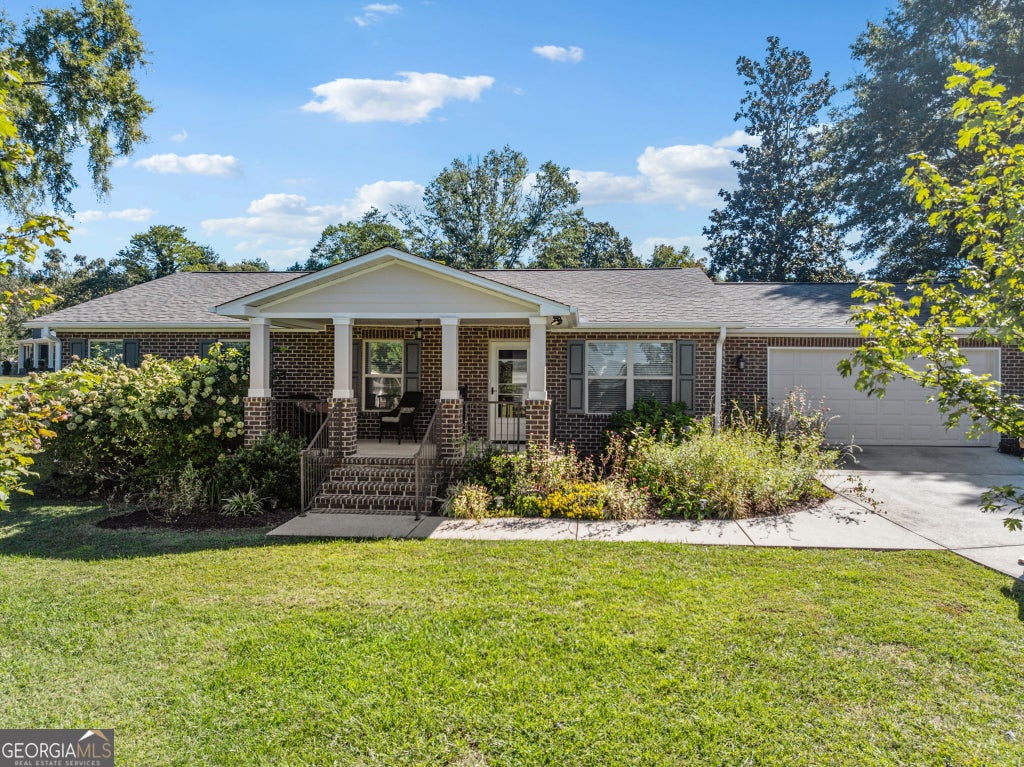 Photo of 13 Faulkner ST, Cleveland, GA 30528 (MLS # 10869648)
