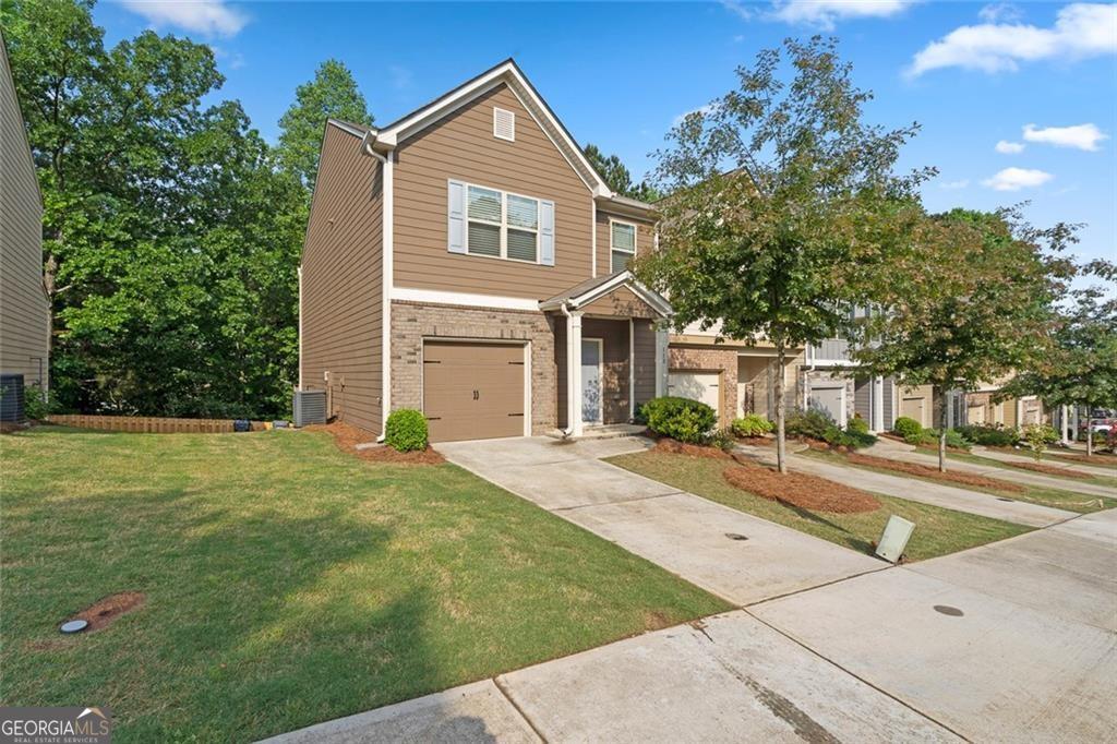 113 Oakview Passage, Canton, GA 30114 - $2,500/mo - Available September 1st This beautifully maintained 3-bedroom, 2.5-bath end-unit townhome is located in the highly sought-after River Green community. The main level features an open layout with a spacious kitchen that includes granite countertops, stainless steel appliances, and a large island that overlooks the dining and living areas. Upstairs, you'll find a large primary suite with a shiplap accent wall, double vanities, a walk-in shower, and a huge walk-in closet. Two additional bedrooms, a full bath, and an upstairs laundry room offer both space and convenience. Enjoy peaceful wooded views from the private back deck, plus the convenience of a one-car garage with driveway parking. Residents also have access to incredible community amenities, including pools, tennis courts, playgrounds, trails, and a fitness center. Professionally managed by Pinnacle Real Estate. Available for move-in September 1st!