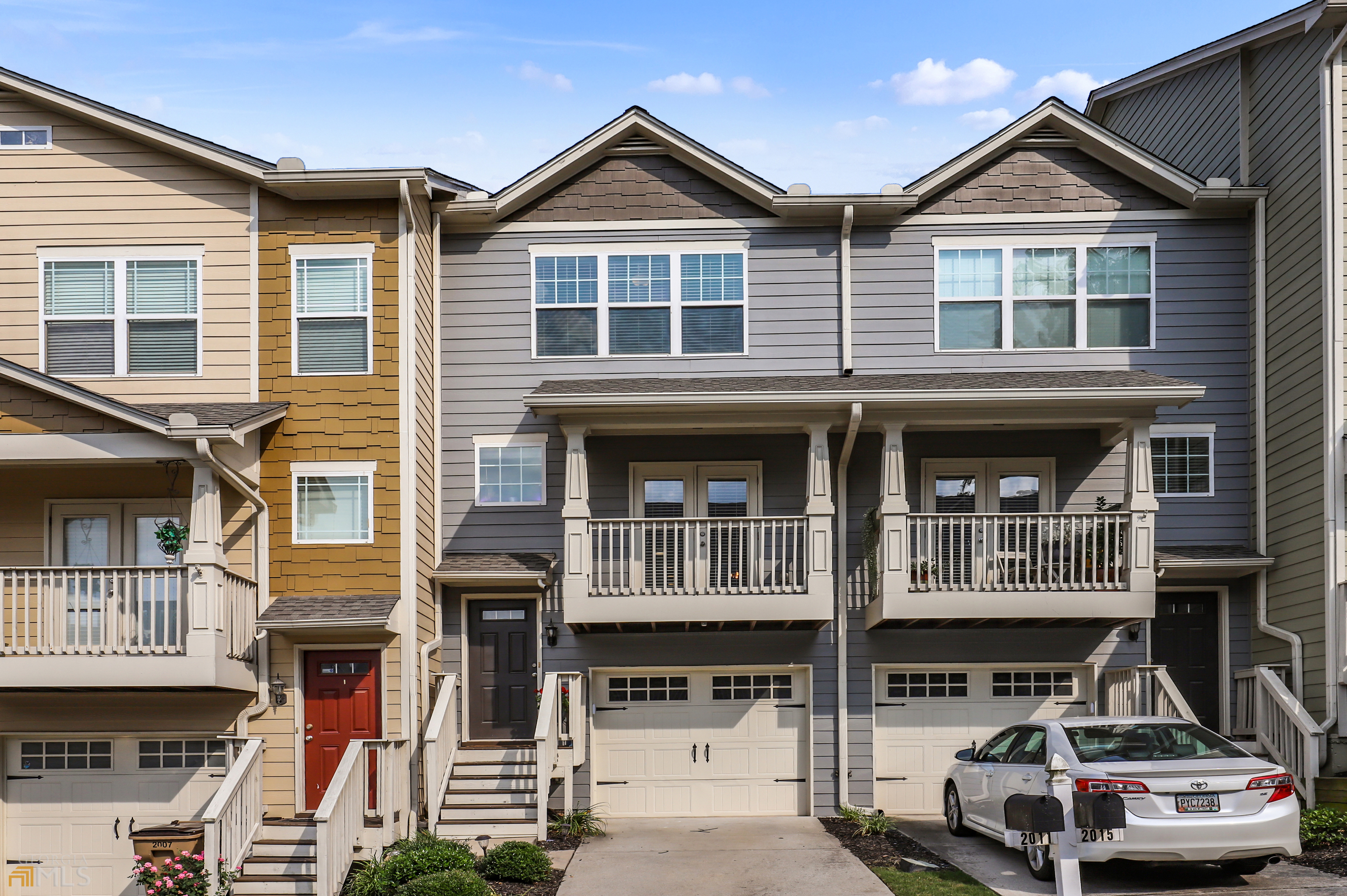 Location, Location Location! Must see townhome in Liberty Park! Nestled towards the back of the community has tons of natural light and modern finishes. Spacious kitchen has tons of storage including a pantry and a separate area for a table. The huge island with granite tops is perfect for cozy get togethers. Stainless appliances and LVP( luxury vynyl plank) flooring complete the main living area.Stairways leading up to main level are oak hardwood and have been newly installed. Spacious elevated rear deck. Upstairs, find two spacious bedrooms, each with its own bath and convenient laundry room in the hallway. On the lower level, the third bedroom, also with a full bath and a private exit, can easily be used for an office or playroom. Custom blinds throughout. One car attached garage offers more storage and privacy. Driveway is much longer than others with room for full size SUV or truck. Community is gated with a manned guard house, resort-like pool for your summer fun and a park for your pooch. In the fall wonderful city views abound. Close to shopping area restaurants, including The Works, Bellwood Quarry Park, Scofflaw Brewery, Top Golf and the Atlanta Beltline! Not to mention, easy access to downtown, midtown, Buckhead. Just a few minutes drive to I75 and I285. The Westside is the hottest area in town with plenty to do and see !