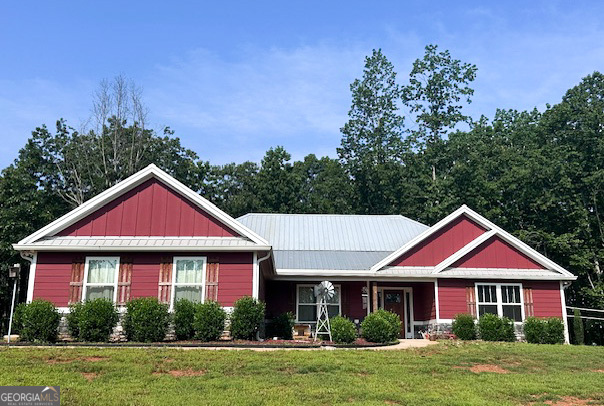 Country Living with Room to Roam - 11+ Acre Farmstead with Spacious Home & Workshop! This beautifully designed 4-bedroom, 3-bathroom home offers a spacious open-concept layout with a split-bedroom plan, perfectly blending comfort, functionality, and privacy. Whether you're looking to spread out or host family and friends, this home provides all the space you need inside and out. The 11+ acre property is fully equipped for country living and animal lovers alike. It features two fenced-in pastures, one includes a stall with a lean-to and an enclosed chicken coop. The second pasture boasts a picturesque 3-stall red barn complete with a custom feed room and is enclosed with barbed wire fencing. Whether you're raising chickens, goats, horses, or other animals, this versatile farmstead is ready to meet your needs. Nature lovers will appreciate the abundant wildlife that roam the property, including deer, turkey, squirrels, raccoons, and more. It's the perfect setting for wildlife enthusiasts-whether you enjoy harvesting game or simply watching as they wander through your front and back yard. This unique farmstead offers the best of country living-privacy, space, functionality, and natural beauty-all in one incredible package.