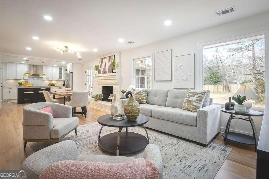 Charming Renovated Ranch on 1.27 Acres - No HOA & Top Schools!  This 4-bedroom, 3-bath ranch blends timeless character with modern updates on a private 1.27-acre lot in an established no-HOA neighborhood. Thoughtfully renovated, it preserves its original charm while offering stylish upgrades for today's lifestyle.     Thoughtful Design & Open Concept Living  The four-sided brick exterior maintains its classic appeal, while inside, the original hardwood floors have been refinished and seamlessly extended. The open floor plan offers stunning backyard views, filling the home with natural light.    The flex space near the entry is perfect as an office, playroom, or additional living area. The cozy living and dining area features a wood-burning fireplace, creating a warm and inviting atmosphere.     Chef's Kitchen & Entertaining Spaces   White shaker cabinets with soft-close drawers   Leathered granite countertops with high-end appeal   Pot filler, deep stainless steel sink & all-new stainless appliances   Walk-in pantry & laundry room nearby   Massive screened-in sunroom leading to a new flagstone patio & courtyard     A Backyard Like No Other  The 1.27-acre lot is beautifully maintained and feels like a private park. With room for a pool, garden, and expansion, this space is ideal for outdoor lovers.     Spacious Bedrooms & Spa-Like Bathrooms   Large guest bedrooms with ample closet space   Guest bath with double vanities & tub/shower combo   Primary suite with a huge walk-in closet   Luxury ensuite with a rain shower, bidet toilet & towel warmer     Incredible Basement Potential   Private front entry & separate HVAC system   Spacious living area & bedroom   Electric fireplace & ample lighting   Plumbing stubbed for future kitchen or laundry   New basement windows & full waterproofing (lifetime warranty!)     Additional Features   Oversized two-car garage   New partial driveway for added convenience   Located in a highly desirable school district   Zoned to prevent high-density apartments, preserving community value    Located minutes from Kennesaw Mountain, Marietta Square, and major interstates, this move-in-ready home offers character, space, and modern convenience in one of Marietta's most sought-after areas.     Schedule your showing today-this one won't last!