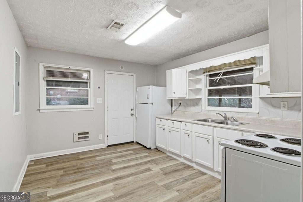 Photo of 685 Melrose Drive, Forest Park, GA 30297 (MLS # 10662393)