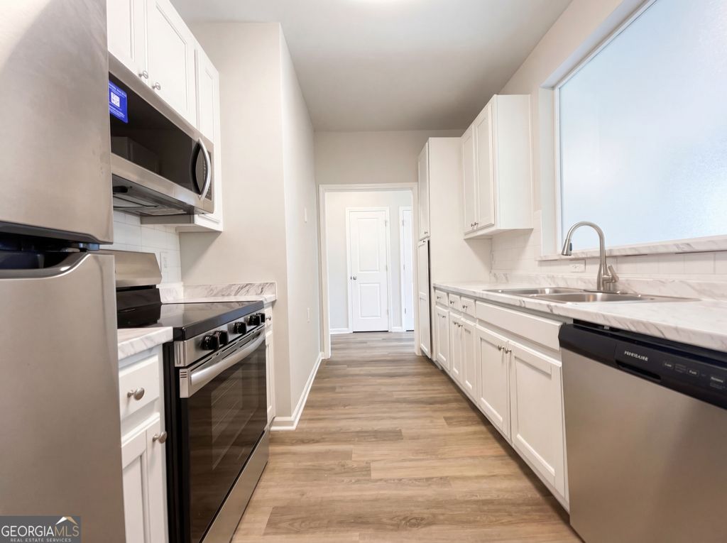 Photo of 825 Commerce Boulevard, Riverdale, GA 30296 (MLS # 10711392)