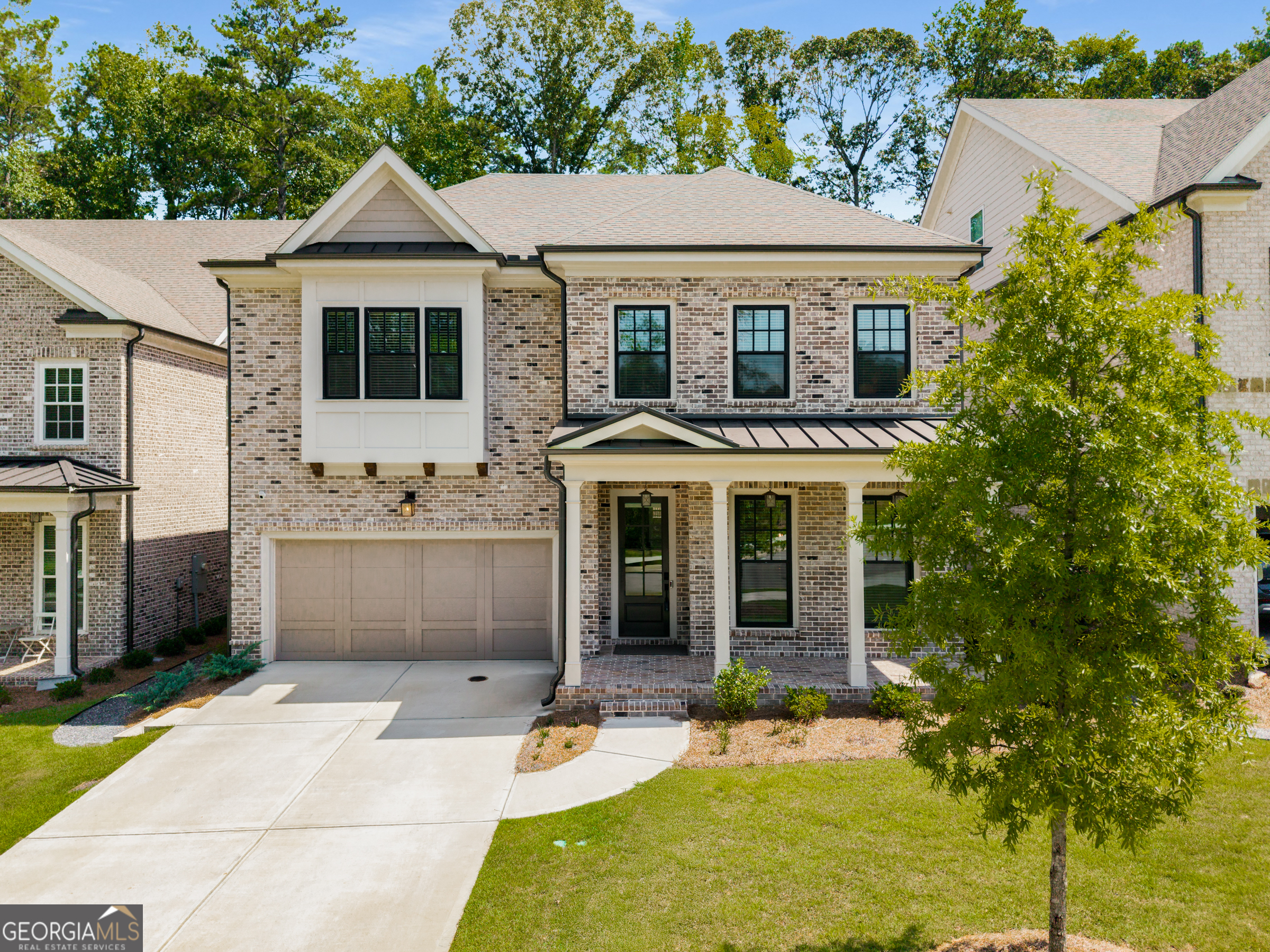 || TWO PRIMARY BEDROOMS (MAIN + UPPER LEVEL) || || CUSTOM CLOSETS IN BOTH SUITES || || QUARTZ COUNTERTOPS + ENERGY STAR APPLIANCES || || RING SECURITY SYSTEM + SMART LOCKS || || TANKLESS WATER HEATER || || UPGRADED FLOORING THROUGHOUT || || WALKABLE TO TOP-RATED JOHNS CREEK SCHOOLS || FENCED YARD|| ** What You'll See ** Step inside and notice the wide-plank UPGRADED FLOORING that flows through each level of the home, guiding you into a sun-soaked SUNROOM that feels like a natural extension of the outdoors. Your eyes will be drawn to the dramatic VAULTED CEILINGS, the sleek QUARTZ COUNTERTOPS in the kitchen, and the clean lines of ENERGY STAR QUALIFIED APPLIANCES. Both PRIMARY BEDROOMS - one upstairs and one on the main level - feature CUSTOM CLOSETS built to impress. The backyard offers room to garden, relax, or entertain. ** What You'll Hear ** Whether you're enjoying morning coffee in the SUNROOM or winding down in the backyard, you'll notice how peaceful the neighborhood sounds. Inside, the whisper-quiet ENERGY-EFFICIENT HVAC and tankless water heater maintain comfort without disruption. The RING SECURITY SYSTEM provides audible peace of mind - from motion alerts to door notifications - ensuring you're always in the know. ** What You'll Feel ** Feel the comfort of modern living with SMART LOCKS and an integrated security setup that gives you control and confidence. The soft morning light pouring into the main-level bedroom creates a serene start to your day, while the upstairs suite offers privacy and warmth - perfect for guests or multigenerational living. The layout flows naturally, making movement throughout the home feel effortless. ** What You'll Experience ** Live within a thriving Johns Creek community - just minutes to Peachtree Corners, Alpharetta, and Midtown. Enjoy easy access to world-class dining like Pampas Steakhouse and local favorites like Angelo's Pizza. Take advantage of nearby parks, trails, golf courses, and the upcoming MEDLEY DEVELOPMENT for retail, entertainment, and more. Zoned to some of the best schools in the state - with State Bridge Elementary and Johns Creek High just a stroll away - this home places you at the center of it all. HOA dues paid monthly at $175.
