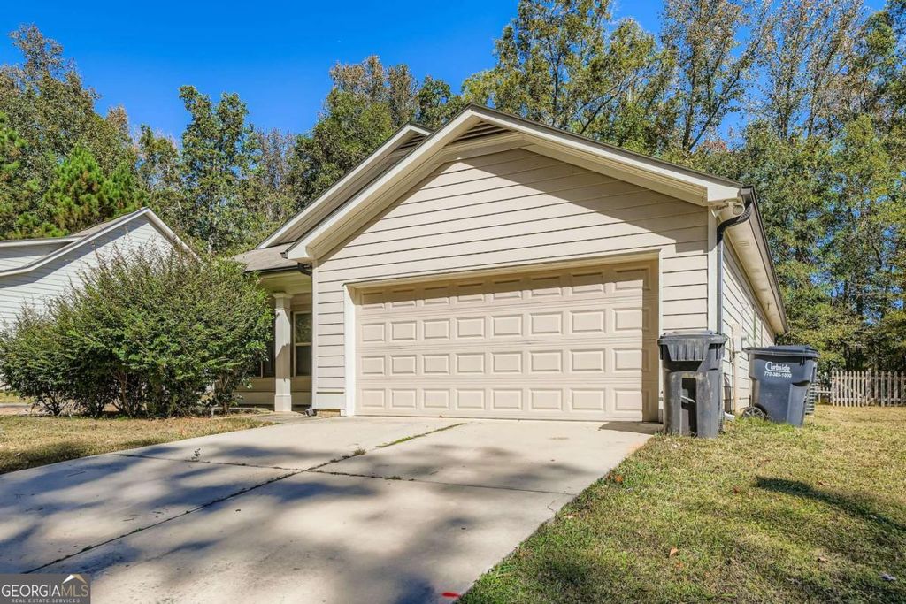 Photo of 215 Eagles Parkway, Covington, GA 30014 (MLS # 10631623)