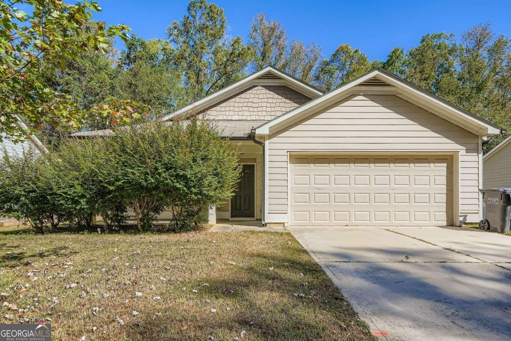Photo of 215 Eagles Parkway, Covington, GA 30014 (MLS # 10631623)