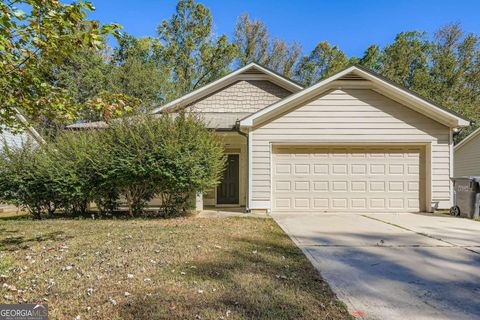 Photo of 215 Eagles Parkway, Covington, GA 30014 (MLS # 10631623)