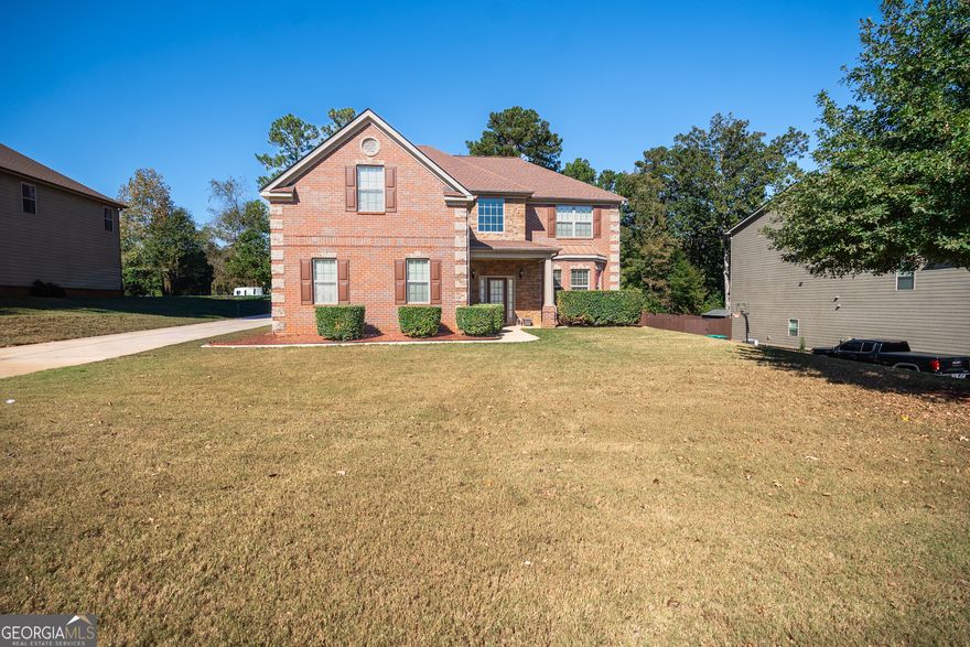 Welcome Home To Your Move In Ready Dutchtown School District Brick Front Home.  You'll Step Into The Two Story Foyer and Experience The Open Floorplan.  Formal Living Room and Dining Room To Your Right and Family Room with Fireplace To Your Left.  The Kitchen Contains Granite Countertops, Wall Oven, Cooktop Range, and Pantry.  Rear Stair Access From Family Room Leads Upstairs to Four Large Bedrooms.  The Primary Suite Features Spacing For Sitting Area, Huge Walk In Closet, Bath With Separate Tub and Shower.  Privacy Fence Surrounds Backyard With Patio and Deck.      Home Is Conveniently Located Off Jonesboro Rd Near Multiple Grocery Stores, Restaurants, and Shopping.