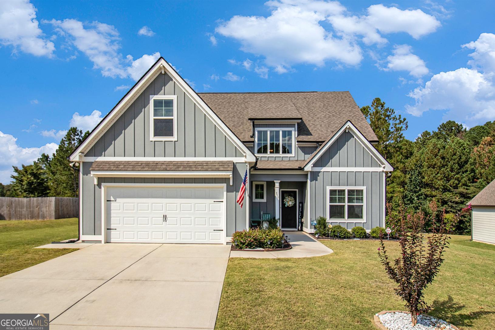 Charming 2021 Home in Senoia - 350 Cushing St., Senoia, GA 30276 Welcome to this beautifully built, move-in ready single family home located in Senoia. Offering 4 bedrooms and 4 full baths - this home delivers both comfort and style. Step inside and enjoy modern conveniences like hardwood and carpeted flooring, a cozy fireplace, and a well-appointed kitchen with white cabinets and a large island with granite countertops. The attached garage and slab foundation add to ease and practicality. Built in 2021, you'll appreciate the newer construction quality, with care taken in both interior and exterior features. The home has excellent layout flow and sits in a desirable neighborhood setting in the 30276 zip. Perfect for buyers looking for a newer, low-maintenance home, with space to grow, and convenient access to the amenities and charm of Senoia. Schedule your showing today to see all this one has to offer!