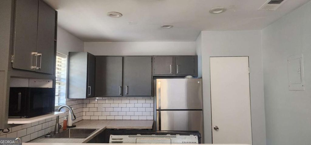 Photo of 3991 Ester Drive SW, Atlanta, GA 30331 (MLS # 10810136)