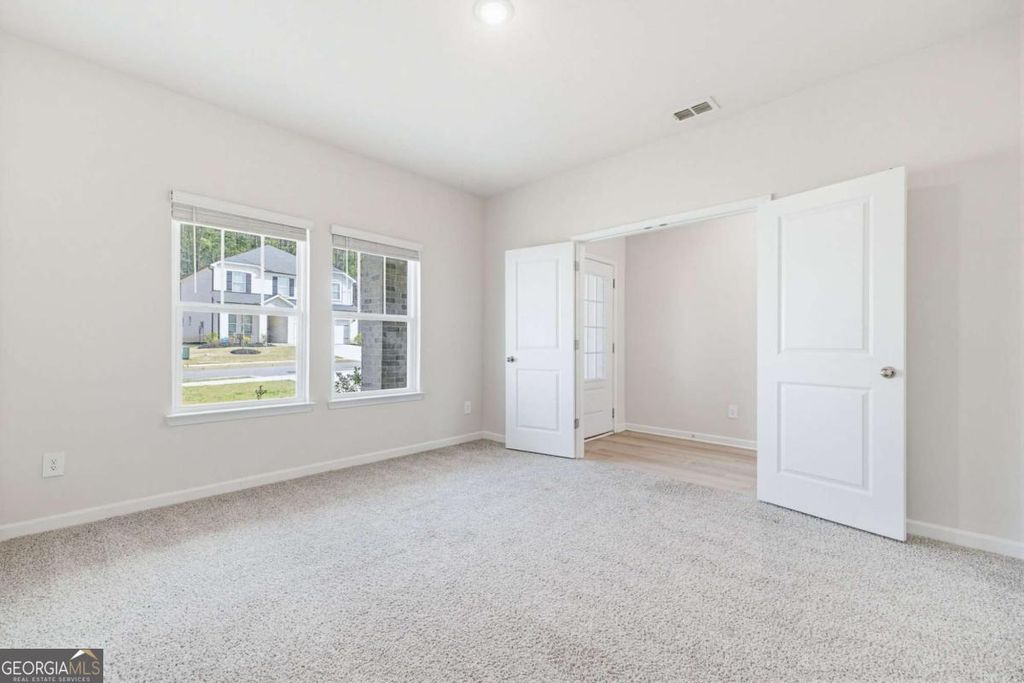 Photo of 7768 Richmond Trail, Fairburn, GA 30213 (MLS # 10724760)