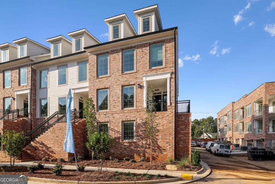 READY FOR MOVE IN! Like Brand New Construction Crawford Stacked Townhome! Incredible mixed-use, live/work/play designed community! Steps from The Maxwell Retail Featuring Rena's Italian Fishery, Fairway Social, July Moon also steps from the new Starbuck's and Shake Shack, on the Alpha Loop and only 1/2 mile from the Alpha Square! You cannot beat the location! This two story home features an open design, GE stainless appliances, quartz kitchen countertops, huge island for entertaining and tons of storage! 1 car attached garage with driveway for additional parking! Beautiful White design package and hardwoods! Swimming pool, cabana & bocce ball!