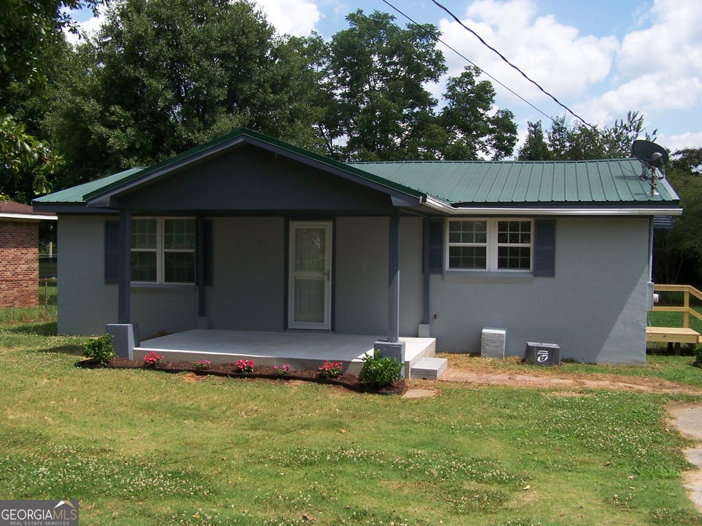 Photo of 450 Annie P Henderson Drive, Social Circle, GA 30025 (MLS # 10797162)
