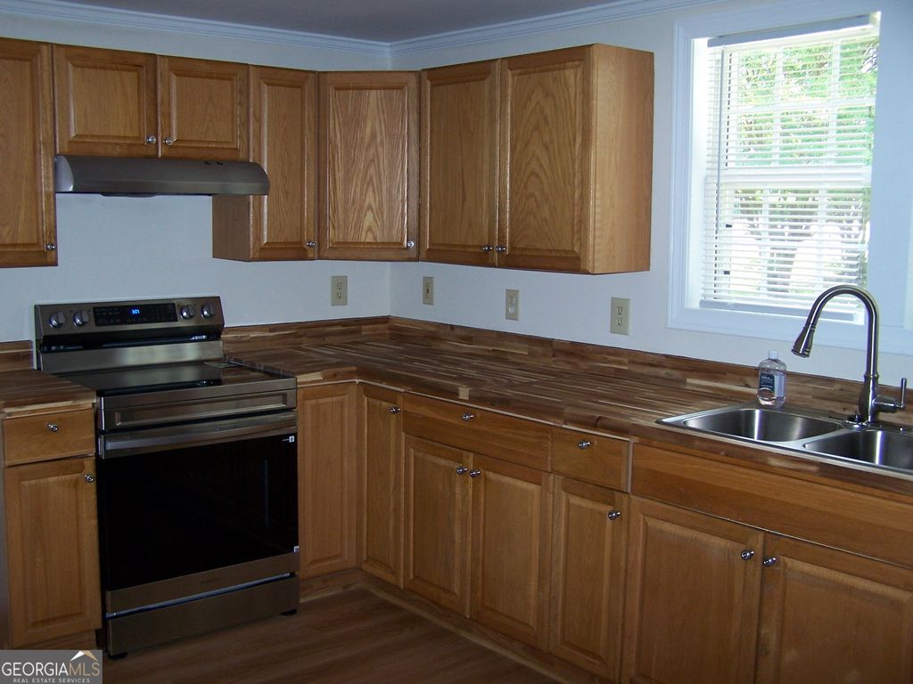 Photo of 450 Annie P Henderson Drive, Social Circle, GA 30025 (MLS # 10797162)