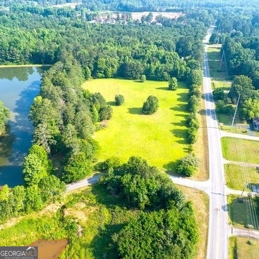 Currently Zoned Residential. There are so many possibilities with this flat open lot. All utilities are available including sewer.