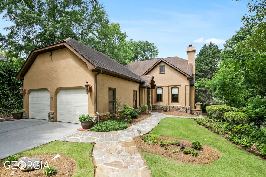 Stunning European hardcoat stucco home in Sandy Springs' High Point neighborhood. The home features three finished levels of generous space with 9' & 10' ceilings, hardwood floors on main and upper levels with exquisite crown moldings. Beautiful stone entry foyer welcomes you to Great Room with judges paneling, stone fireplace with adjacent wet bar, flanked by craftsman cabinetry. Opens to Library between Large Dining Room with wood coffered ceiling and dual butler pantries. Gorgeous huge picture window overlooks private backyard. Inviting Chef's Kitchen has stainless appliances, double oven, 6-burner gas cooktop with 36" hood, microwave oven & quality oak cabinets with large pantry. The kitchen is open to breakfast room with 15' vaulted ceiling and door to outside deck with stairs to backyard. Master bedroom on main has custom built-ins with french door access to private, enclosed garden patio. Spacious master bathroom has dual vanities & multi-spray double shower with frameless glass doors. Upper floor features two bedrooms with large walk-in closets &I shared full bath between. Terrace level has 2 bedrooms with 1 full bath and is perfect for in-law or teen suite. Rear media/game room provides dual door access to coffered loggia with attractive orchard stone floor and walkways. Enjoyable private level rear yard is usable outdoor living area.