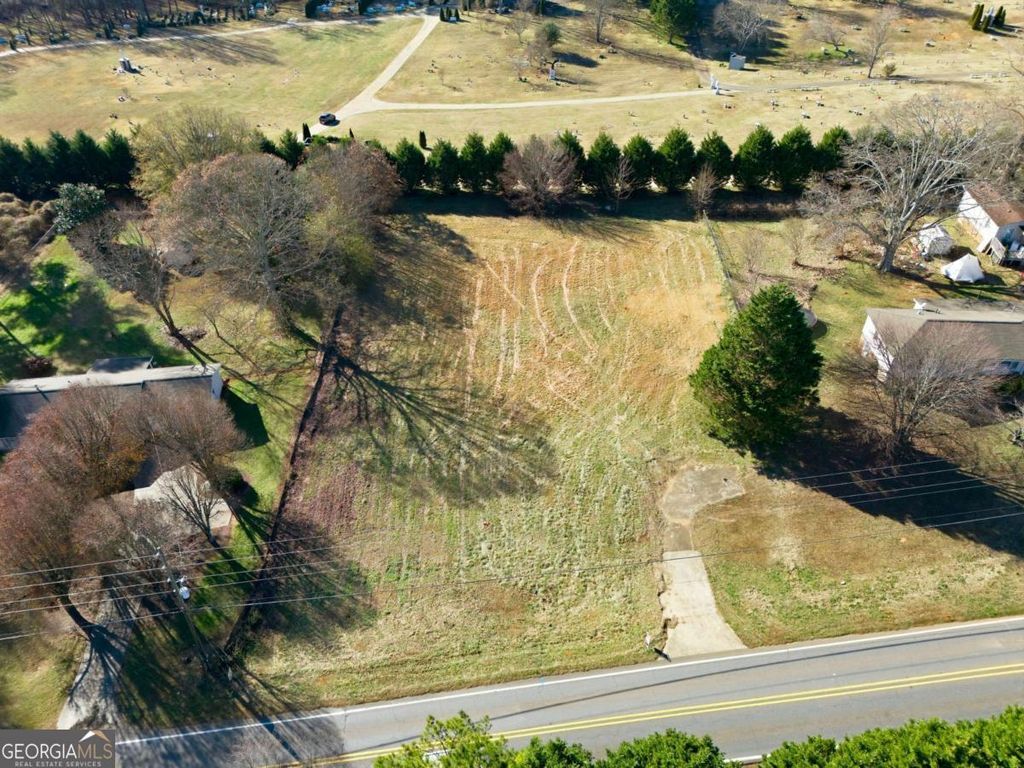 Photo of 10587 E Cherokee Drive, Canton, GA 30115 (MLS # 10659633)