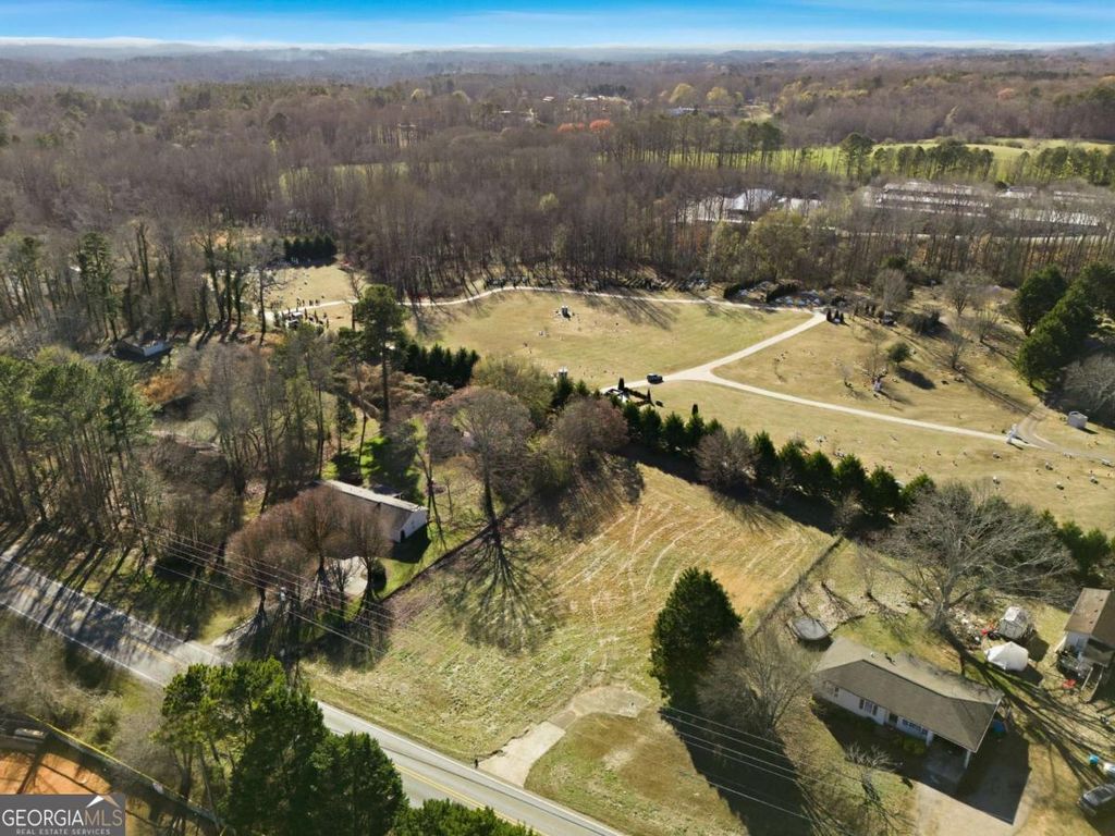 Photo of 10587 E Cherokee Drive, Canton, GA 30115 (MLS # 10659633)