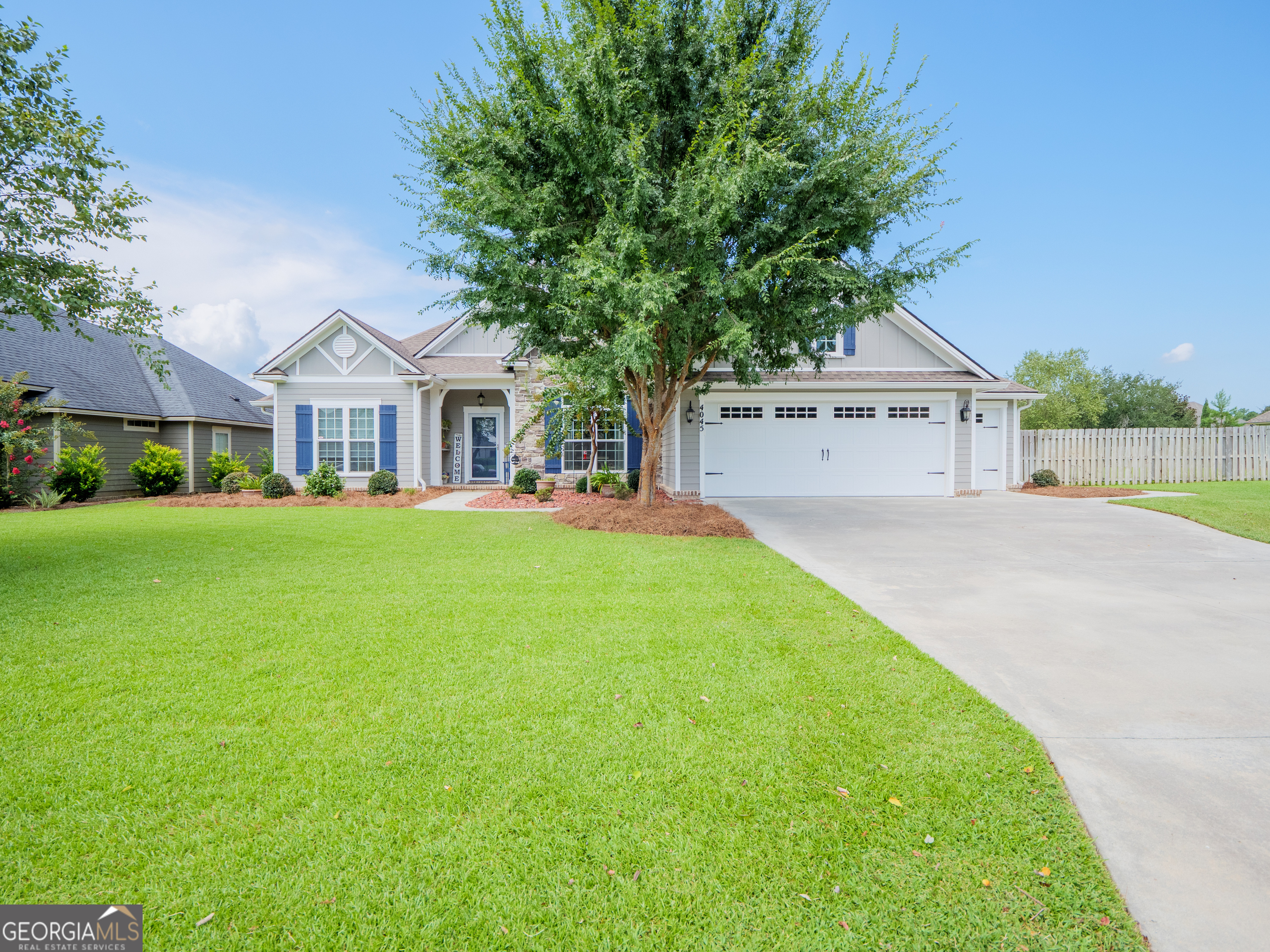 Located in the prestigious Kinderlou Forest Subdivision, this one-owner home built by Dixon Taylor Construction has been impeccably maintained. Featuring 4 bedrooms and 3 full baths, each bedroom offers private bath access for comfort and convenience. The open living room boasts a stone fireplace and flows seamlessly into the beautiful kitchen with granite countertops, tile backsplash, and abundant custom cabinetry. The spacious master suite includes two large walk-in closets, an en-suite bath with dual vanities, a corner soaking tub, tiled walk-in shower, and private water closet. Wood floors enhance much of the home, and the rear sunroom provides flexible living space with a pretty view of the patio sitting area in the fenced in back yard. A large 2-car garage plus a 3rd bay is perfect for golf carts, bikes, or storage. Enjoy manicured landscaping in both front and back yards. Community amenities include a staffed gated entrance, pools, tennis and pickleball courts, chapel, restaurant, playground, fitness center, and the renowned Davis Love III designed golf course. Truly a beautiful home in a first-class community! For more information on Kinderlou Forest S/D, visit their website at https://www.kinderlou-golf.com.