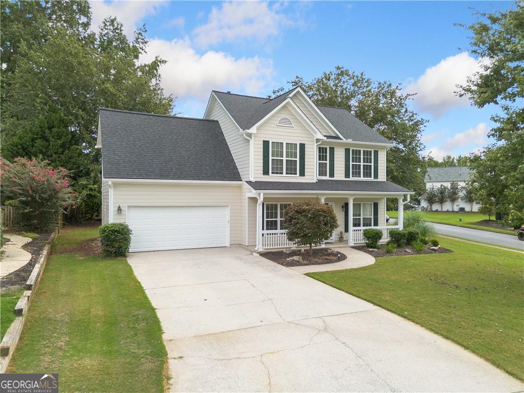 Looking for four bedrooms, a separate dining room, a formal living room, and a family room in 30101? Look no further. Check out this spacious home on a large, level corner lot in the sought-after McEver Park subdivision. Exterior features include an easy in and out level driveway and a friendly front porch for sittin' and sippin'. Don't miss the etched glass front door! The two-story foyer is flanked by a large living room (presently being used as an exercise room) and a formal dining room (which the owner has flexed into a bright home office space). The kitchen offers good food prep space and lots of storage, a breakfast bar, and a sunny eat-in area graced with a bay window; direct access to the garage, which features a new garage door, is great for bringing in groceries or supplies, and a nearby half bath and is tremendously convenient. From the kitchen you have a view of the family room with a fireplace and room for tv watching and family fun. The second floor is spacious with a convenient laundry area and a sun-drenched, over-sized primary suite with a big closet that features custom cabinetry to maximize storage space. The primary bath includes double vanities, a walk-in shower, and a garden tub. All secondary bedrooms are ample, and one is large enough to accommodate a king-sized bed and accompanying furniture (perfect for a roommate situation or an adult family member). Enjoy the great outdoors on this covered front porch or back patio. This home has been consistently well-maintained by the owner (not flipped by a cost-cutter). The main level HVAC was replaced in 2020, and the upper-level HVAC was replaced in 2021. Other upgrades include new gutters and downspouts in 2022, and a new roof, a new garage door, and a new dishwasher in 2024. In July of 2025 the entire exterior was repainted and refreshed, and beautiful LV wood flooring was installed throughout the main level. The desirable McEver Park community is less than 10 minutes from Downtown Acworth, lively nightlife, restaurants, Wellstar, Emory Healthcare, and highly-ranked schools, including McCall Primary (grades K through 1st), Acworth Elementary (grades 2nd through 5th), Barber Middle School, and North Cobb High School -- all within a 3-mile radius of McEver Park. The only thing missing from this delightful home is YOU!
