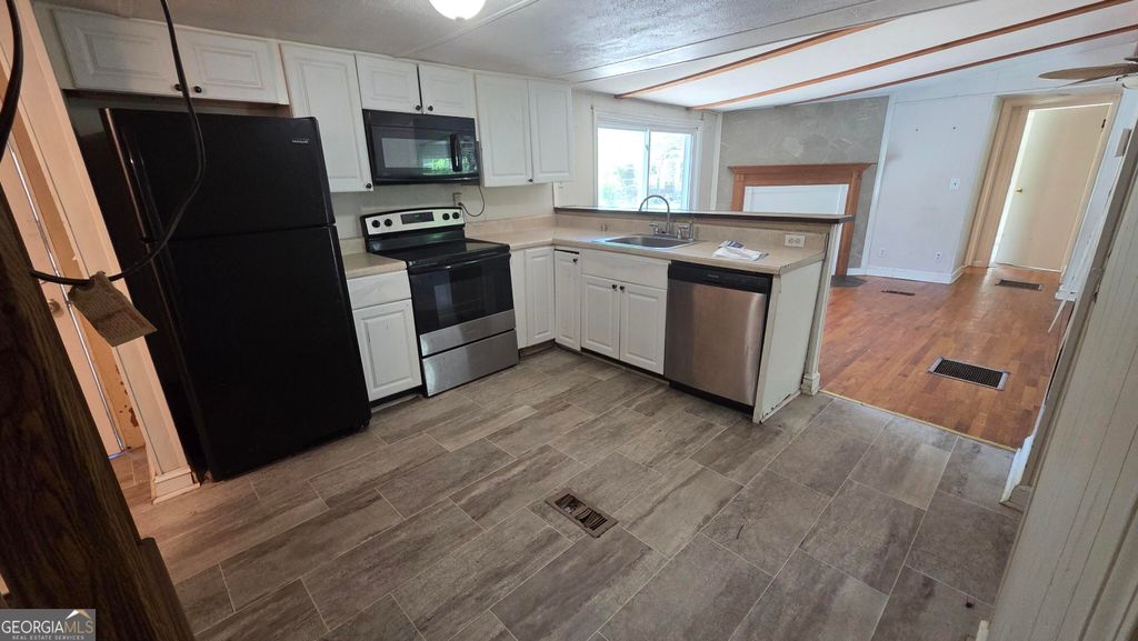 Photo of 25 Fischer Way, Sharpsburg, GA 30277 (MLS # 10727129)