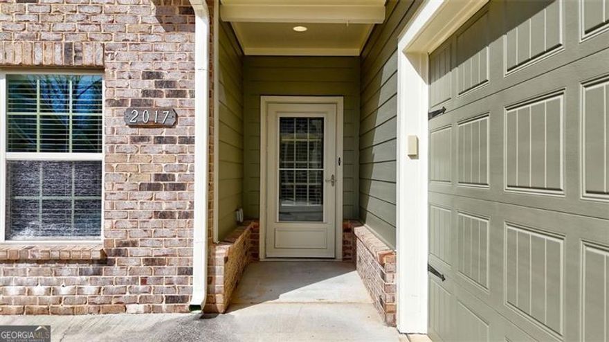 The low-maintenance lifestyle you've been looking for awaits you in this stunning retreat in sought-after Grove Park, a 55+, amenity rich community in Marietta. This light, bright, and open "Magnolia" floorplan home is the larger floorplan available in the community and offers elegance throughout. This home shows like a model home and is ideal for hosting friends & family for all occasions, boasting one-level living plus a finished 2nd-story loft! This home features a coveted covered back patio with sliding glass windows for the perfect indoor/outdoor living space to enjoy year-round! Beautiful hardwood floors are further complimented by tall ceilings, a spacious kitchen with tons of prep space, stained wood cabinets, under cabinet lighting, stainless steel appliances + huge walk-in pantry. You'll love all the finished storage space on the main level and upstairs. All exterior building/roof maintenance and yard maintenance included in your monthly HOA dues + water/trash/sewer! Grove Park features gated access and a beautiful Clubhouse with catering kitchen, gym, and library; a swimming pool; a dog park; a composting area; and walking paths throughout the community. In addition to loving your turn-key home, you will love the convenience to the dining, entertainment, and attractions of Historic Marietta Square (10-minute drive!). Plus, you can take advantage of the proximity to hiking trails around Kennesaw Mountain or go shopping at The Avenue West Cobb! Washer, Dryer, and Deep Freezer also come with this impeccably maintained home, making it move-in ready for you!