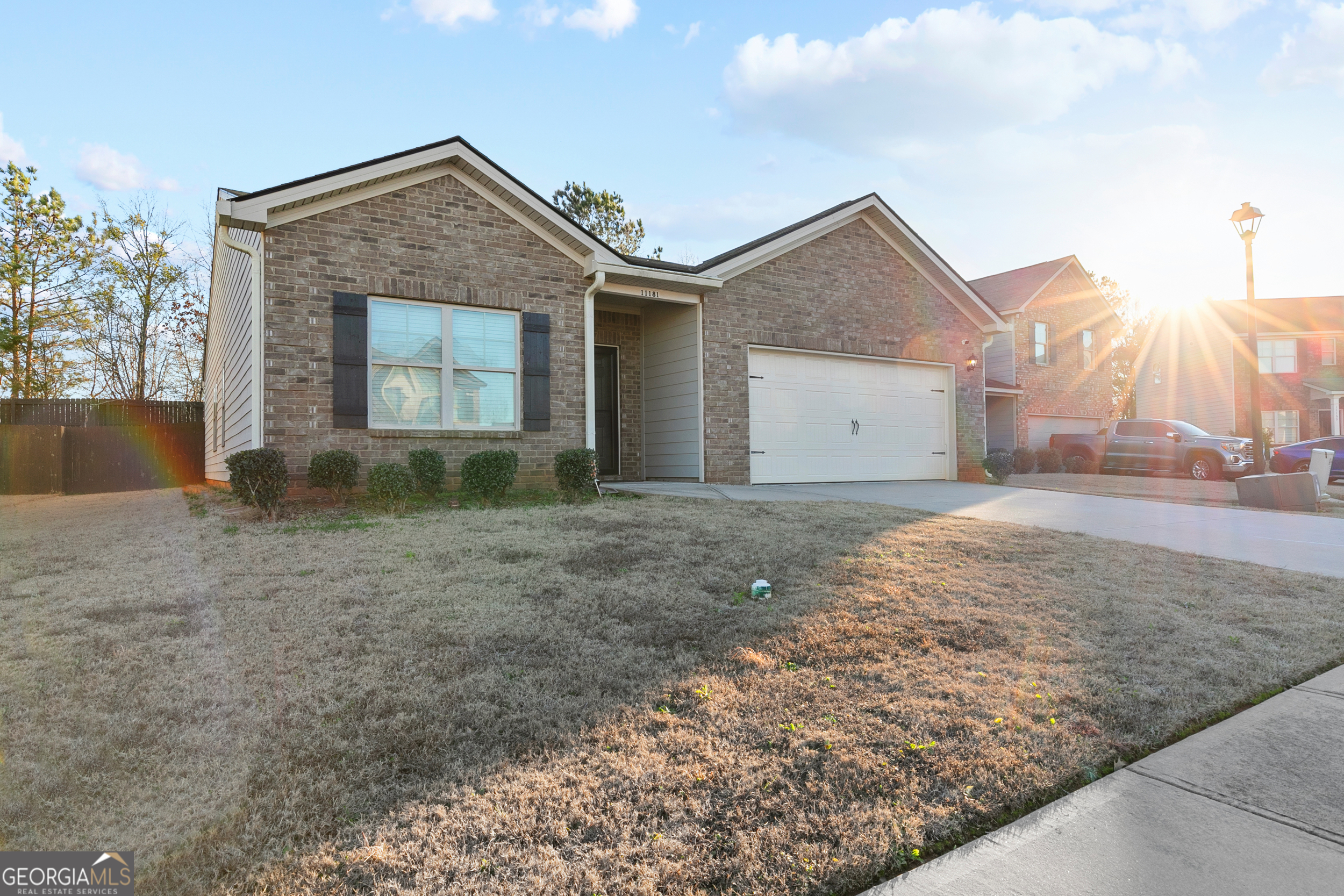 Welcome to the delightful Cannon floorplan in the sought-after Lovejoy Station neighborhood. This charming ranch-style home offers the ease of single-level living with a thoughtfully crafted split-bedroom layout. The master bedroom is a peaceful sanctuary, featuring sophisticated trey ceilings and a spacious walk-in closet. Three generously sized secondary bedrooms each include large closet spaces. The modern kitchen is equipped with sleek stainless steel appliances and stunning granite countertops, creating a stylish and practical space. The open-concept design facilitates effortless interaction between the living, dining, and kitchen areas, making it perfect for everyday living and entertaining. Step outside to your private, fenced yard. This home is an excellent choice for those seeking comfort, style, and convenience. Plus, it has an assumable mortgage of $237k with a 5.62% interest rate!