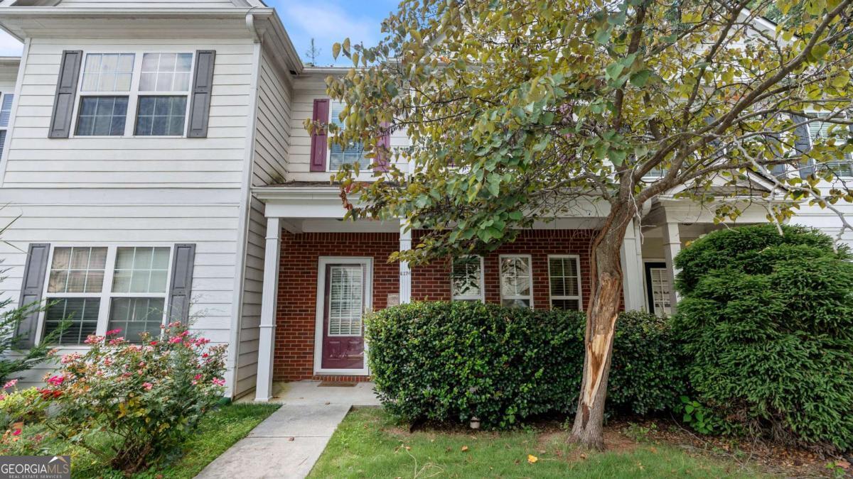 Welcome to 4176 Flat Trail, Union City, GA - An incredible value in a rapidly growing area! This home is being sold fully furnished-just bring your suitcase and settle right in! This home is move-in ready, has 3-bedrooms, 2.5-baths and is tucked inside a gated community. It is just minutes from the airport and a short drive to downtown Atlanta. Step inside through the charming front porch and foyer entrance into a bright, open layout. The spacious kitchen overlooks the dining and living areas, perfect for entertaining or relaxing by the cozy fireplace. Enjoy your morning coffee or evening wind-down on the private outdoor patio.Upstairs, you'll find a generous owner's suite with double closets and a private ensuite bath. Two additional bedrooms, a full bath, and a convenient laundry room complete the upper level. Close to new developments, MARTA, schools, shopping, dining, and major interstates-this home offers unbeatable access and value. Don't miss this fantastic opportunity in Union City's thriving community!