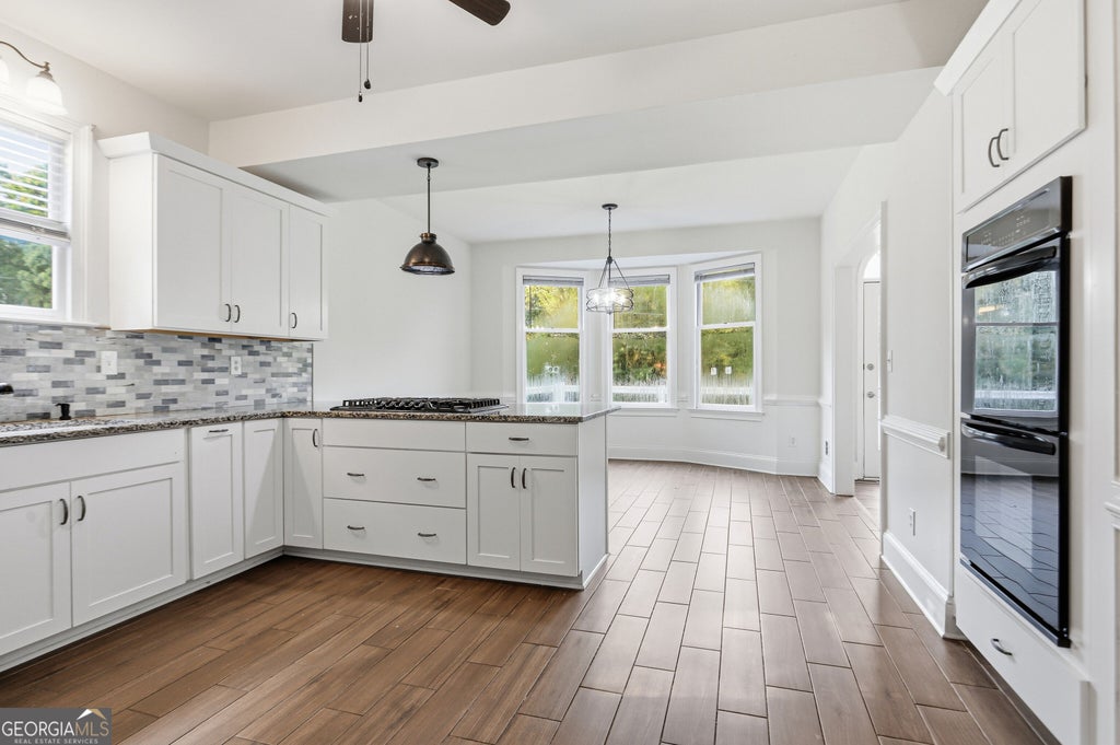 Photo of 1102 Timber Glen Court SW, Lilburn, GA 30047 (MLS # 10874685)