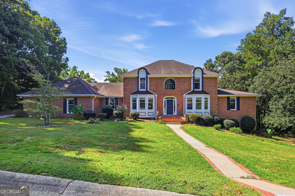 Photo of 1102 Timber Glen Court SW, Lilburn, GA 30047 (MLS # 10874685)