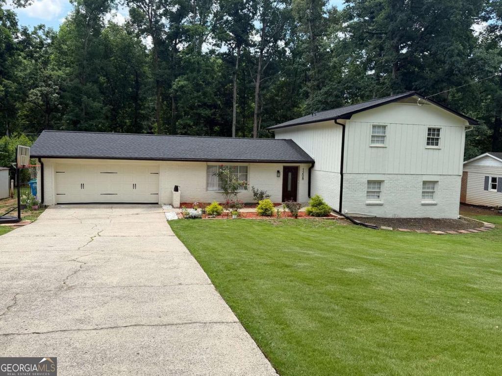Photo of 1208 Golden Circle SW, Lilburn, GA 30047 (MLS # 10777320)