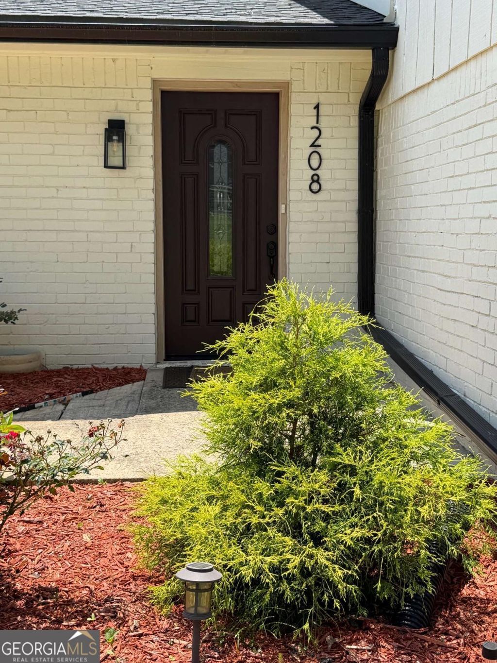 Photo of 1208 Golden Circle SW, Lilburn, GA 30047 (MLS # 10777320)
