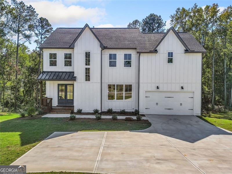 New Construction - Ready to move in! This 5 Bed & 4 Baths features open kitchen, Quartz Countertops, Tile backsplash, SS appliances, double oven, gas cook-top, Large Island w/ views to the family room. Full bed/bath on the main level. Large owner's suite and private owner's bath with large walk-In closet, freestanding tub. Laundry on the upper level. Full unfinished daylight basement. Large 2 car garage, private level, wooded back yard! . No HOA restrictions. Southern Living Custom Builder.