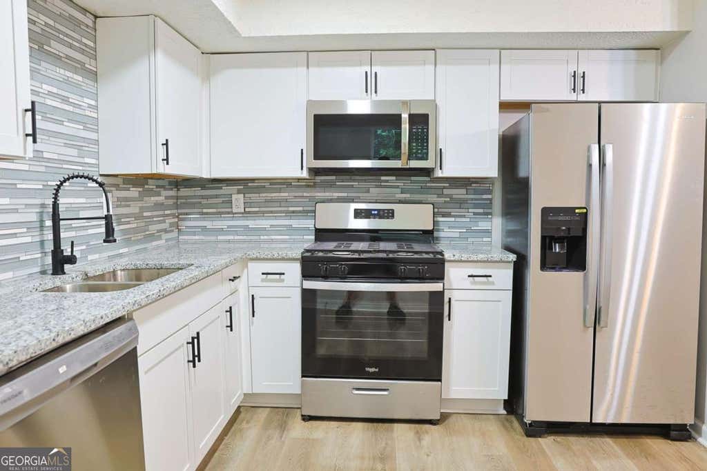 Photo of 4411 Flakes Mill Road, Ellenwood, GA 30294 (MLS # 10780187)