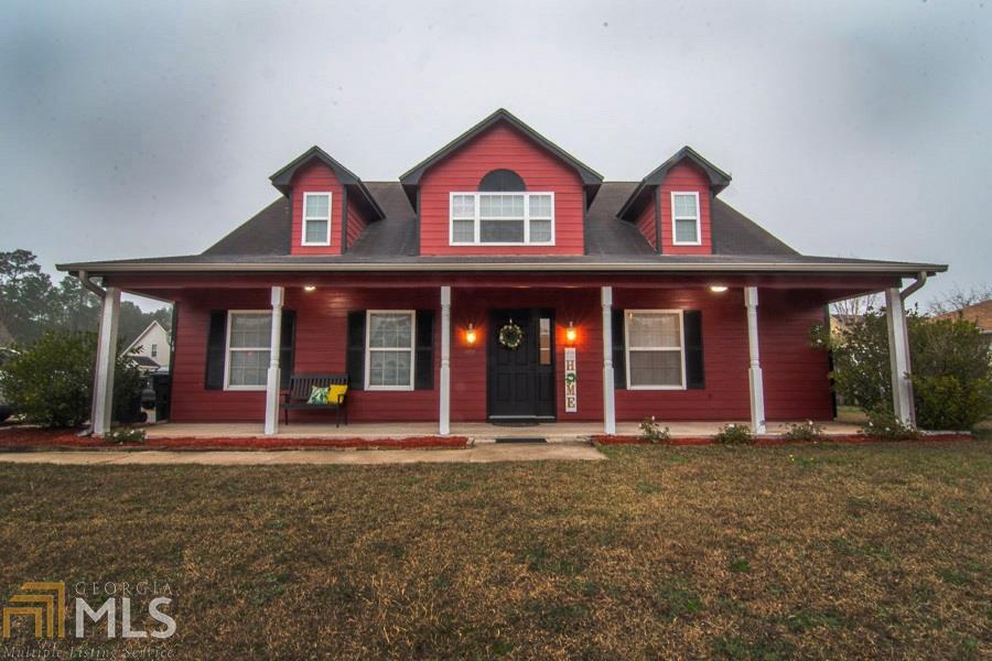 Welcome home to this spacious 5 bedroom 3 bathroom family home! located close to schools! Freshly painted with some newer floors. Sit on the large country style front porch and drink your cold ice tea this summer! Back yard already has fire pit ready for roasting marsh mellows! Large family room opens up to an upstairs loft that can act as an office, another family room or kids play room! Lots of space lots of options! Seller has agreed to give a $2k flooring allowance.