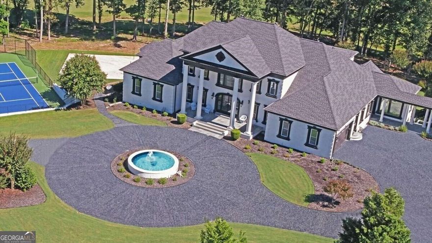 Luxury and serenity await with this extraordinary private custom estate on a 3.6 acre golf course lot with amazing views of the #5 Fairway and T-box on the private Legends Golf Course at Chateau Elan. The exquisite finishes and attention to detail in this remodel must be seen to be appreciated. Enjoy your own resort like retreat with 2 newly refinished tennis courts, a sand volleyball court, covered pagoda, saltwater heated pool, hot tub, gas fire pit, playhouse and a detached garage/workshop for a total of six garages. No detail has been overlooked in this impeccable renovation with too many impressive features to mention here. With seven bedrooms plus an eighth in the carriage house, twelve fireplaces, oversized eighteen seat theater, ten person steam room, hot stone sauna, temperature and humidity controlled wine cellar, whole home audio system, three kitchens, laundry rooms and more, you will be hard pressed to find anything that compares. A study/library along with an additional spacious office are located on the main level as is the primary suite featuring a stone fireplace, an amazing spa-like bath with a spacious shower and soaking tub, laundry, dog wash and a 300 s.f. custom walk in-closet. Entering the heart of the home you will find the great room with a wall of windows overlooking the pool, golf course and pond. Custom built-ins surround the fireplace and are wired for three T.V.'s. The well appointed chef's kitchen features an oversized Brazilian Quartzite island with plenty of storage, double ovens, microwave, two warming drawers, spice racks, cast iron sink, Thermador six burner gas cook top, ice maker, wine cooler, walk in pantry and work station. The fireside keeping room, large eating area and sun room offer plenty of space for family or entertaining. A guest suite with full bath and an additional laundry complete the main level. The upper level is home to four suites all with hardwood flooring, fireplaces and unique bath finishes. The back bedroom has additional space for a nursery or oversized walk-in closet. The terrace level features fourteen foot ceilings, guest suite, full kitchen / bar, eighteen seat theater, family / billiard room with double sided fireplace, exercise room, game room, sauna, steam room, pool bath, laundry room, craft room and a wine cellar! The guest suite over the separate three car garage has a private entrance, full kitchen, sitting area, bedroom and walk-in closet. As beautiful as the interior is, you will be even more amazed with the completely private, resort style backyard. So many options for entertaining or enjoying your own private paradise. Full Legends Golf Membership INCLUDED. Call today to schedule a personal tour of this stunningly renovated home exclusively listed by Funari Realty, LLC.