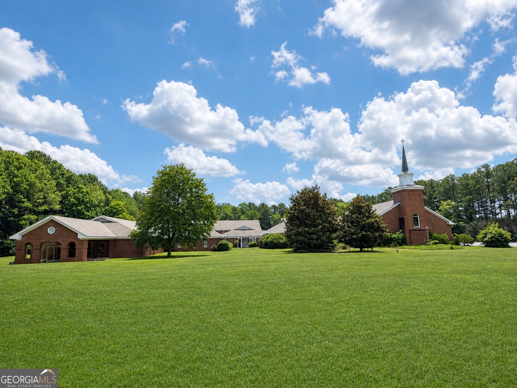 Photo of 847 New Hope Road, Fayetteville, GA 30214 (MLS # 10813979)