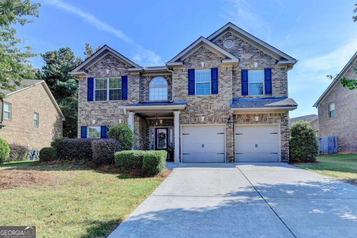 Welcome to this beautiful 4 bdrm/ 2.5 ba home in the sought after Loganville high school district, located in WALTON county, built in 2015! Walk into the front door to a 2 story foyer, family room, and large dining room that fits 12 comfortably (perfect for holiday gatherings and entertaining). The boasts of an open concept as the living room has a view to the kitchen, which includes granite counters, white cabinets, stainless steel appliances, and a large center island. Enjoy the low maintenance of this 4 sided brick home with a level, fenced in back yard with a shed and a large covered porch with custom shades and outdoor TV. Head upstairs to see the oversized master featuring a custom wall and custom walk in closet shelving system. The remaining 3 bedrooms are great sizes also and the laundry room is custom w/ a folding table, backsplash, and cabinet. This home is better than new with all its custom touches and brand new carpet - one you won't want to miss! **Up to 1% in lender incentives available on your financing if using our Preferred Lender** Up to a $4,000 credit that can be used towards down payment or closing costs!