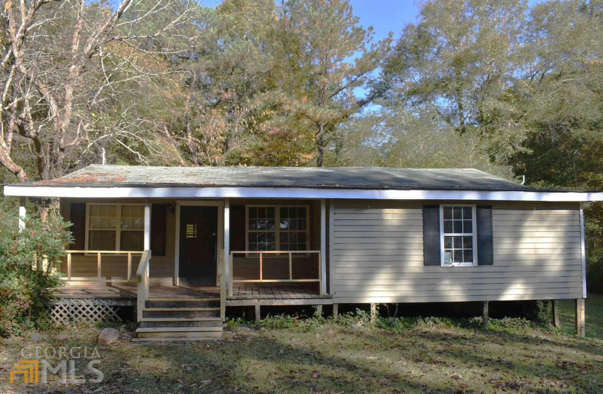 Great investor opportunity! Quaint 2 BR/1BA ranch nestled in a quiet rural area. Convenient to Lone Oak and Grantville. House sits back from the road on a full 1 acre lot with lots of mature trees. Tons of potential to design a quiet sanctuary with existing structure and/or add other buildings to the property. Surrounded by woods and farmland. Property is being offered "AS IS" with no seller's disclosure. Owner has never lived in the property.
