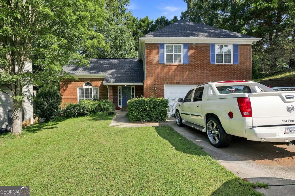 Photo of 1301 Sweet Woods Drive, Lawrenceville, GA 30044 (MLS # 10832828)