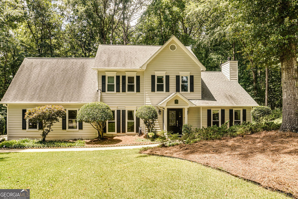 Welcome to this stunning 4-bedroom, 2.5-bathroom home located on a peaceful cul-de-sac. The main level features an inviting living room with a cozy fireplace that seamlessly flows into a bright all-season sunroom-perfect for year-round enjoyment. Adjacent to the sunroom is a spacious eat-in area, situated between the sunroom and the kitchen with modern stainless steel appliances. Upstairs, you'll find all four bedrooms, including the primary suite. The primary bathroom features dual sinks, a tiled walk-in shower, a soaking tub, and a generous walk-in closet. Step outside to enjoy a back deck that overlooks, open backyard-perfect for entertaining or relaxing by the brick fire pit. All windows replaced approximately 6 years ago. Exterior structure professionally painted within the same timeframe. Located in the desirable Kimmeridge community with golf cart path access, and community pool! Enjoy nearby dining, shopping, Trilith Studios and Community. Don't miss this peaceful escape in the heart of it all! 100% financing and up to $5,000 towards closing cost for qualified buyers with preferred lender.