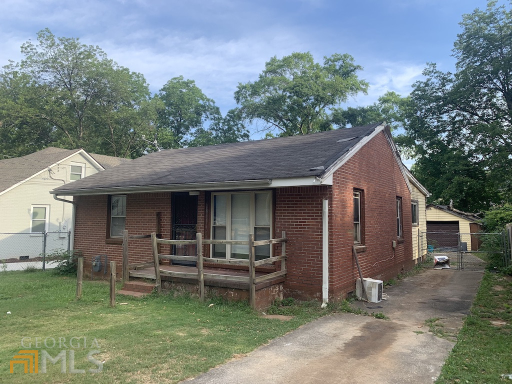 Opportunity is Knocking! Calling all Investors! Bungalow in East Lake Terrace near the prestigious East Lake Golf Club!! Large back yard for expansion or entertainment. Three bedrooms two bathrooms with a detached garage and a Three car driveway. A home with great bones and over 1200 square feet. This home will not last!