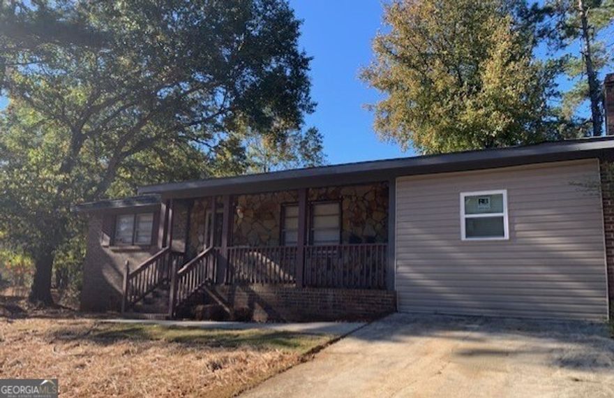 Freshly remodeled affordable home. Must see!!!!!!    4-sided brick   New A/C Unit.   New Roof. New Laminated Flooring.   Small kitchen island.  Built-in electric fireplace.  Recess lighting in the open space.  This house is totally remodeled and move in ready.     Close to all shopping (Walmart, IHOP, Town Center, Tractor Supply, etc.)  Close to Interstate: I-20. Great affordable start up home.