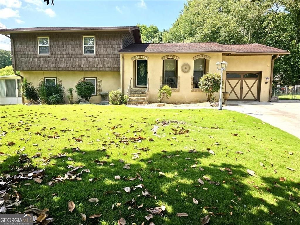 Photo of 1244 Hickory Wood Drive NE, Woodstock, GA 30188 (MLS # 10664361)