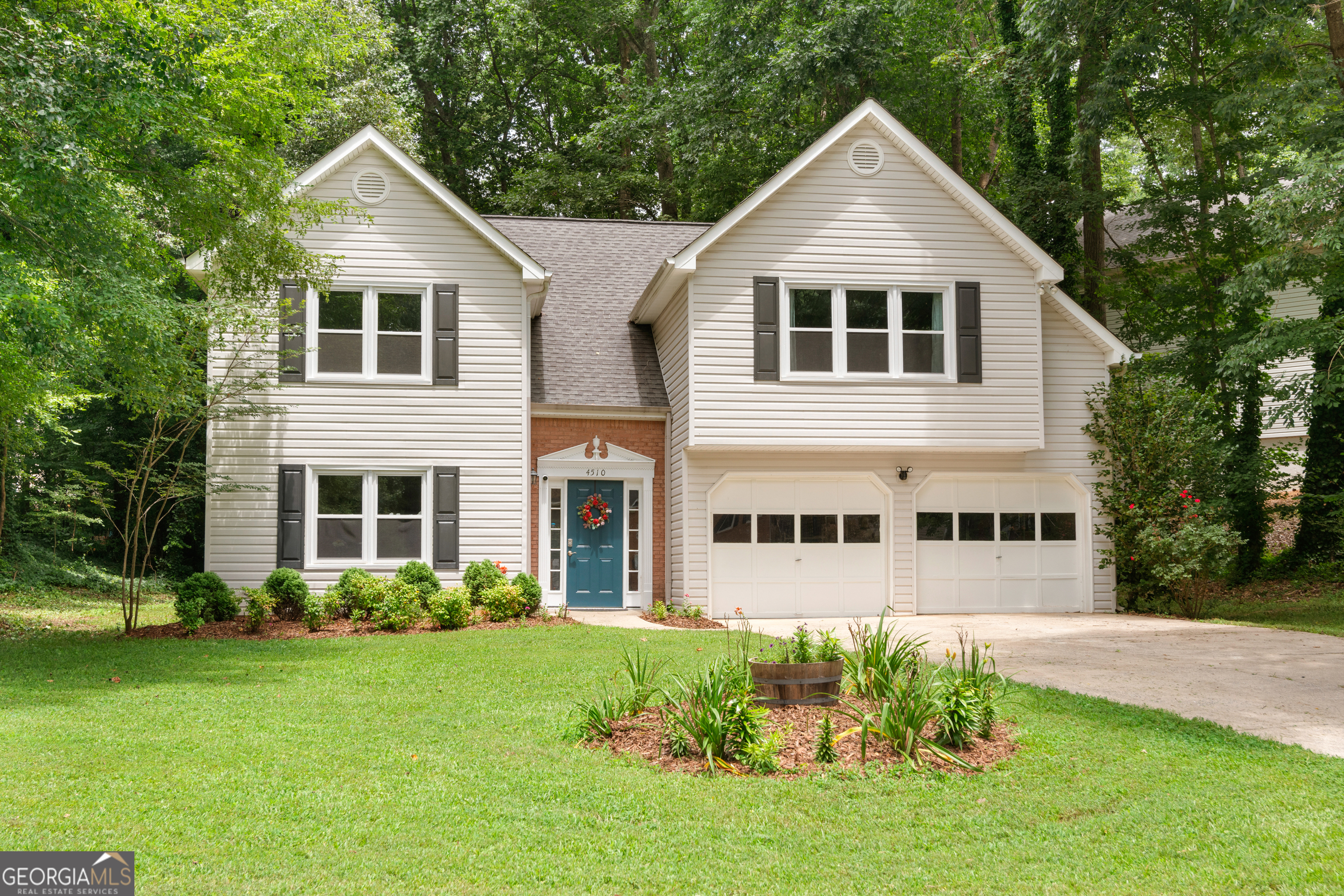 Welcome to 4510 Sagebrush Drive-your charming new beginning in the highly desirable Calumet West community of Kennesaw! Tucked away on a peaceful, tree-lined street, this 3-bedroom, 2.5-bath home sits on a level lot and offers the perfect blend of comfort, style, and convenience in the award-winning Harrison High School District. Step inside to find beautiful Luxury Vinyl Plank flooring that flows throughout the main level. The bright and airy kitchen features classic white cabinetry and a generously sized pantry to keep everything organized. Enjoy your morning coffee in the breakfast nook with lovely views of the front yard. The vaulted Great Room, complete with a cozy gas-starter fireplace, creates a spacious yet inviting atmosphere-ideal for relaxing nights or entertaining guests. The adjacent Dining Area allows everyone to stay connected, whether it's a holiday gathering or a casual weeknight dinner. Or, step outside to your private backyard and patio-perfect for al fresco dining, grilling, or simply unwinding under the shade of mature trees. A sturdy steel shed offers extra storage for yard tools, bikes, or gardening gear. Upstairs, you'll find a thoughtfully designed layout that enhances both function and privacy. A central landing provides space for additional furniture or a reading nook, along with a conveniently located laundry room. The secondary bedrooms and primary suite are separated by this landing, creating privacy for everyone. The serene Primary Suite features a tray ceiling, two large closets, and a beautifully updated en suite bath with a soaking tub, separate shower, and dual vanities. One Bedroom overlooks the front yard, while the third Bedroom, currently used as an office, enjoys tranquil views of the backyard. Calumet West is an amenity-rich community where every day feels like a staycation. Enjoy lighted tennis courts, a swimming pool with plenty of lounge space, a fun-filled playground, a shaded pergola, a basketball net, and a community firepit-perfect for gathering with neighbors and making memories. With its inviting layout, prime location, and active community, this home is the ideal spot to start your next chapter. Come see what makes 4510 Sagebrush Drive such a special place to call home!