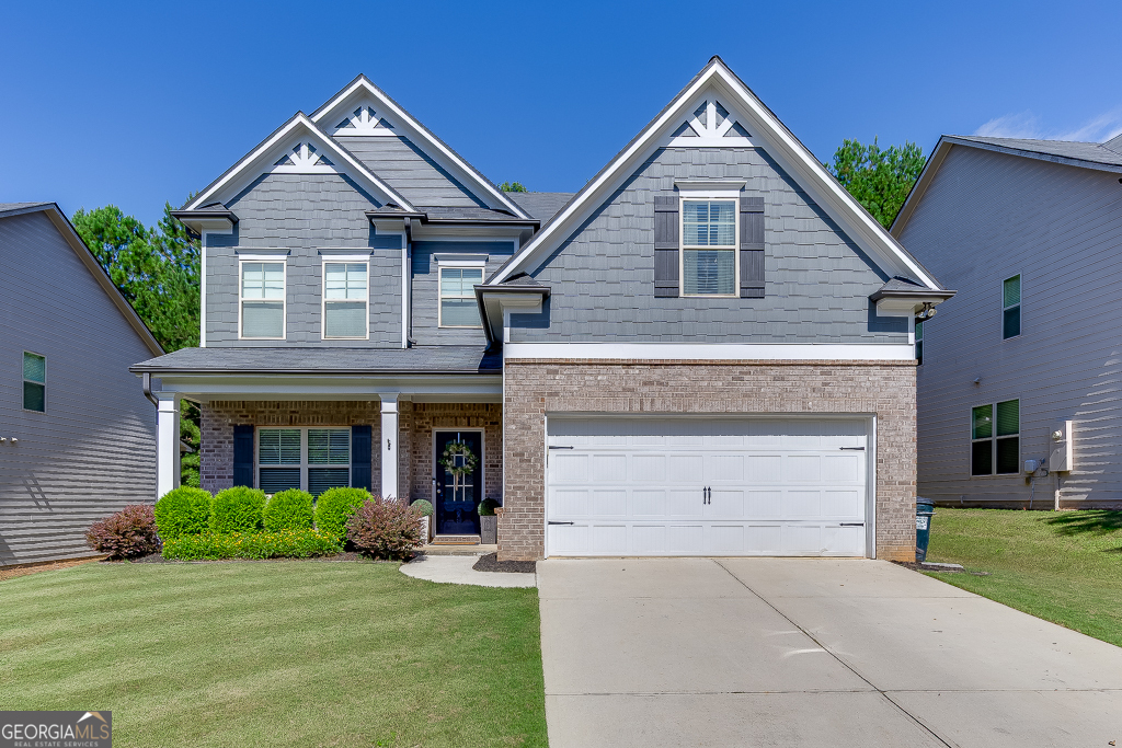 Freshly painted and impeccably maintained, this home offers a true turnkey opportunity your buyers will love. Thoughtfully designed with a guest suite and dedicated office on the main level, plus an oversized loft/media room upstairs perfect for flexible living. The gourmet kitchen impresses with granite countertops, a large center island, 42" white cabinets, and a classic subway tile backsplash-ideal for everyday living and entertaining. Wide-plank 5" hardwoods flow throughout the main level, adding warmth and style. Step outside to a custom covered patio with a built-in fireplace and a fully fenced backyard-ready for year-round enjoyment. Located in a swim/playground community with sidewalks and easy access to I-85, Chateau Elan, and NEGA Medical. 100% USDA financing eligible.